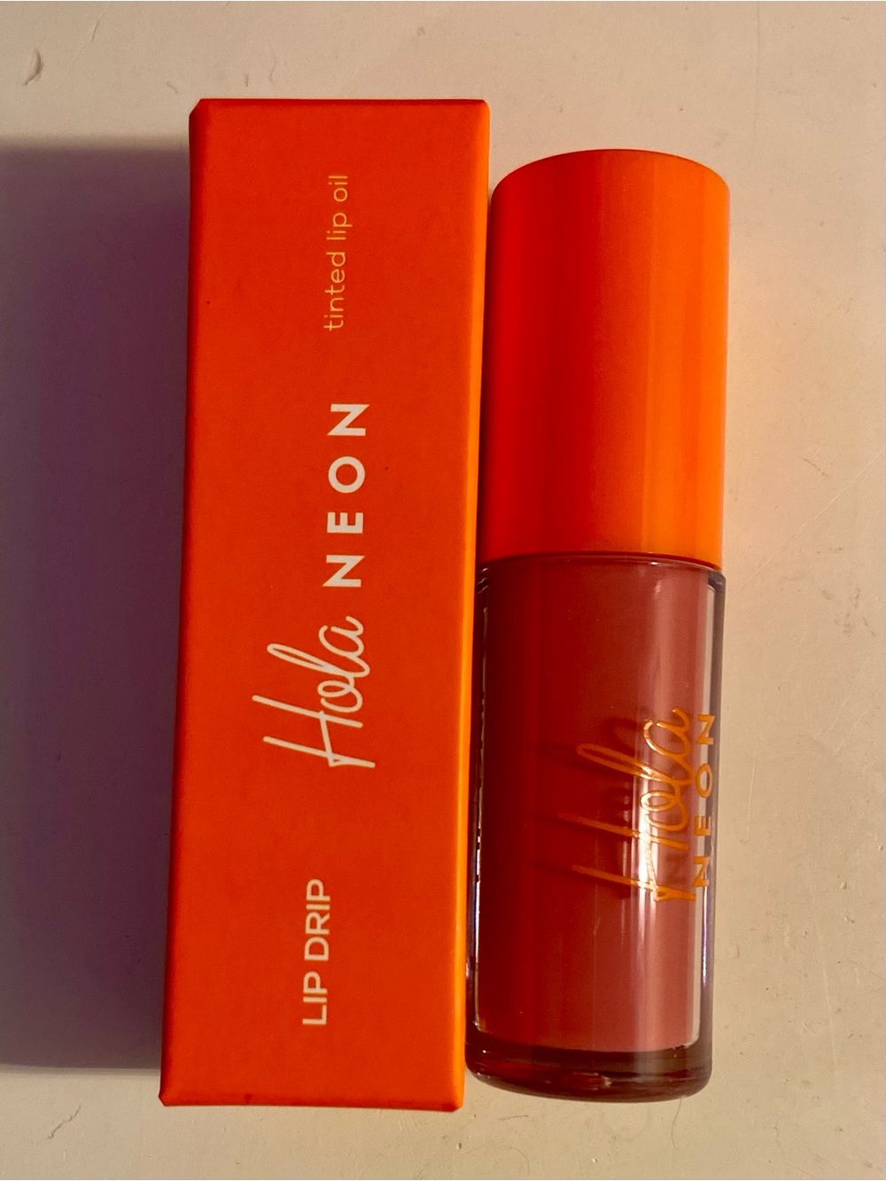 Hola Neon Lip Drip Tinted Lip Oil in “Gloss Me”